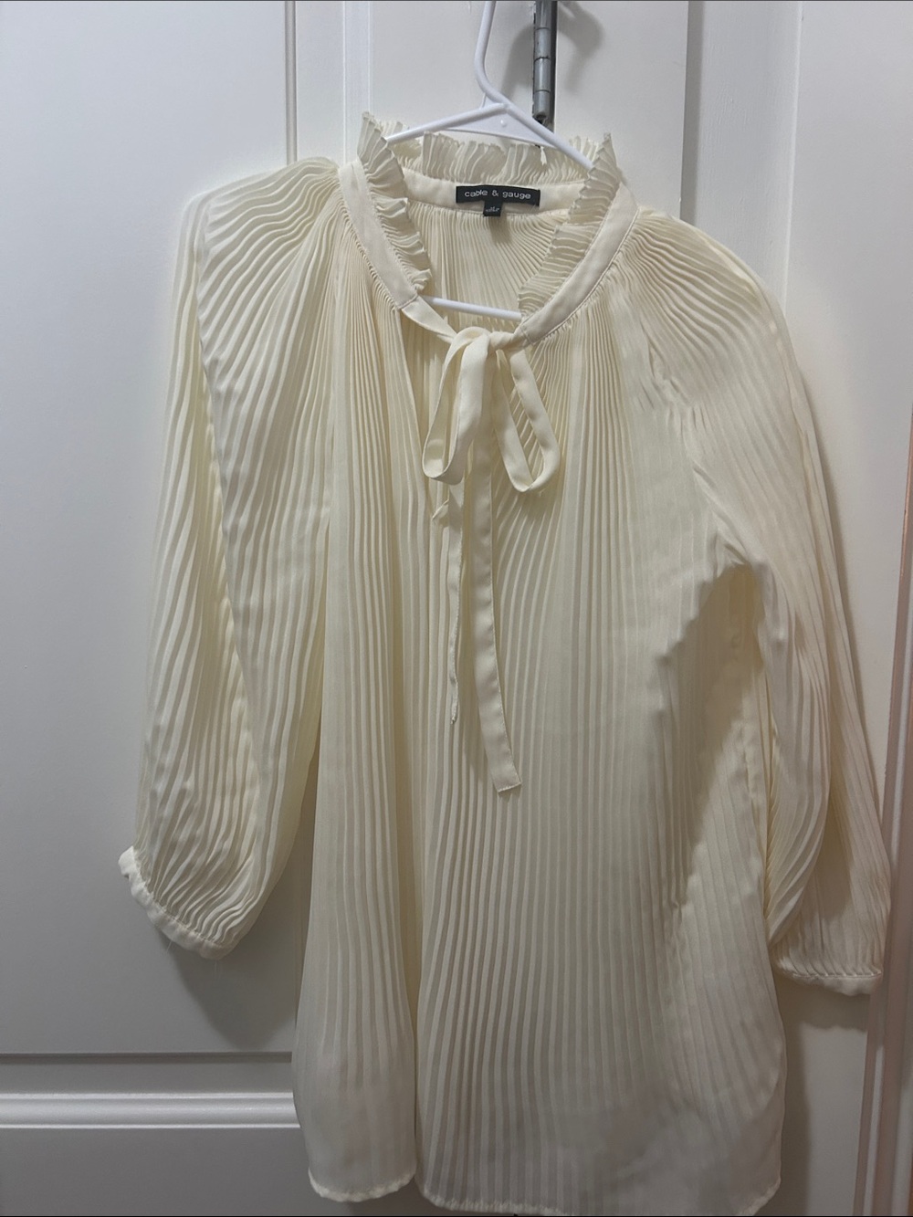 Ivory Pleated Tie-Neck Blouse cable and gauge brand